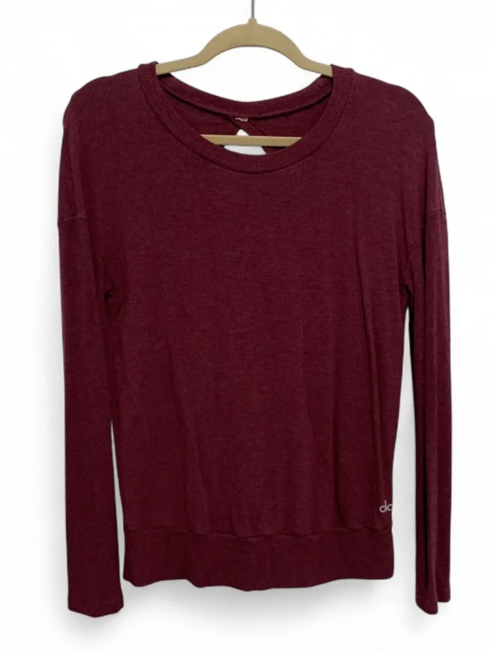 Alo Yoga Intricate Long-Sleeve Cut Out Back Crewneck Top in Wine
